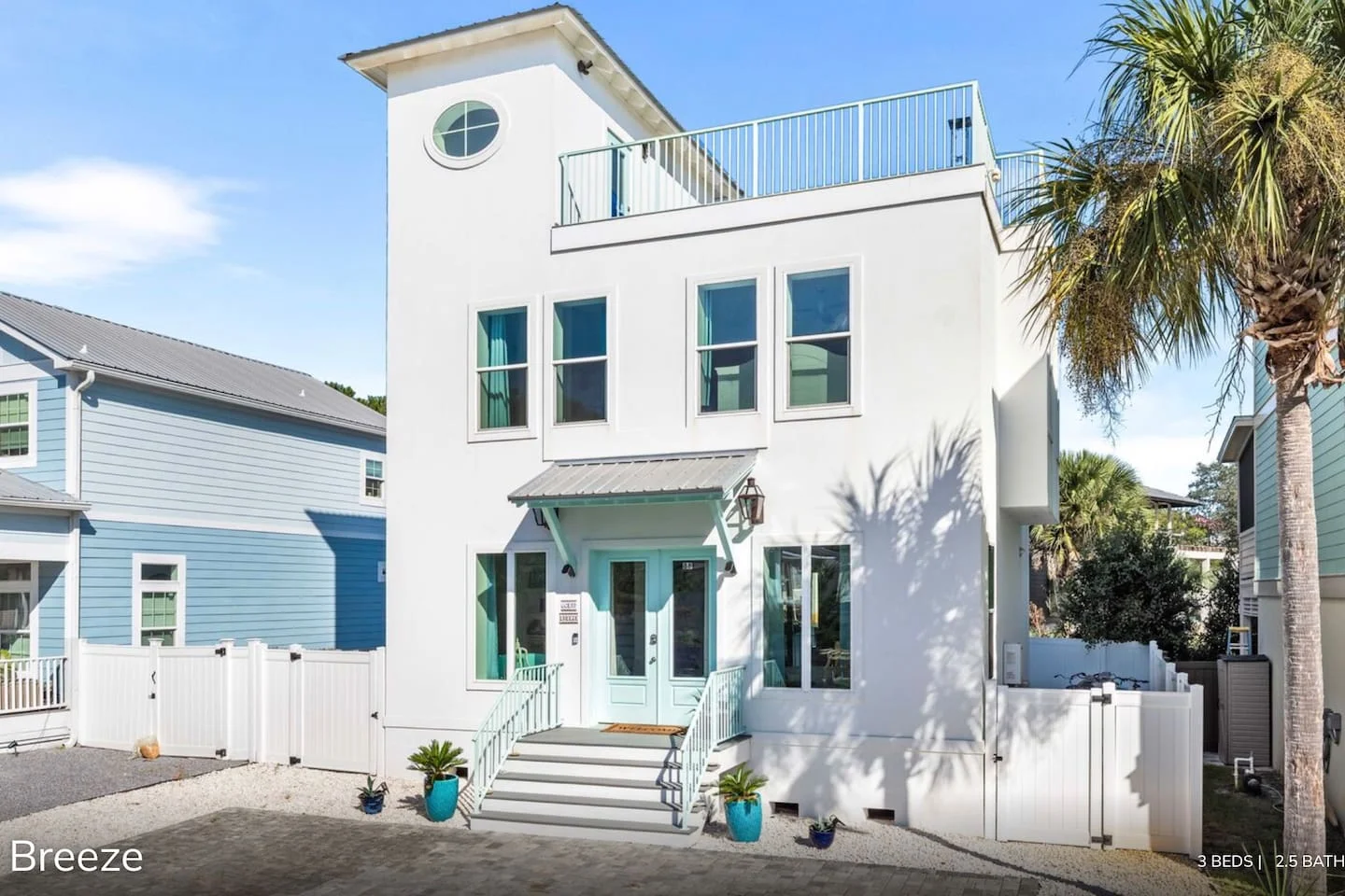 Ocean Breeze beach house exterior with rooftop deck, a top pick among best beach vacations for large groups