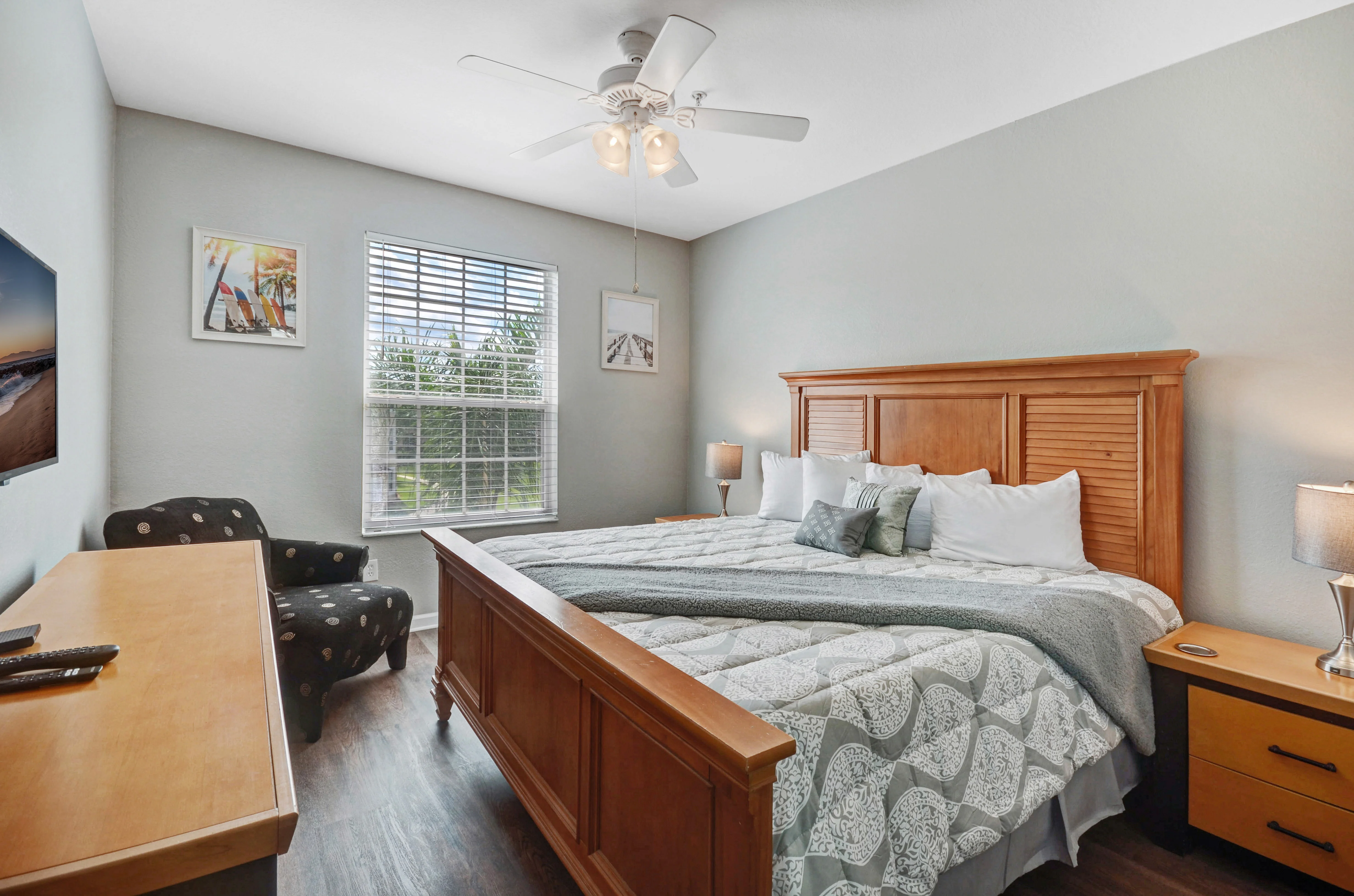 Spacious bedroom with two queen beds and natural lighting in Windsor Palms vacation rental near Davenport