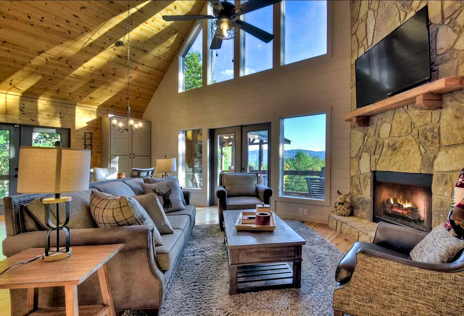 Modern mountain chalet exterior with wooden deck and forest views in Blue Ridge GA
