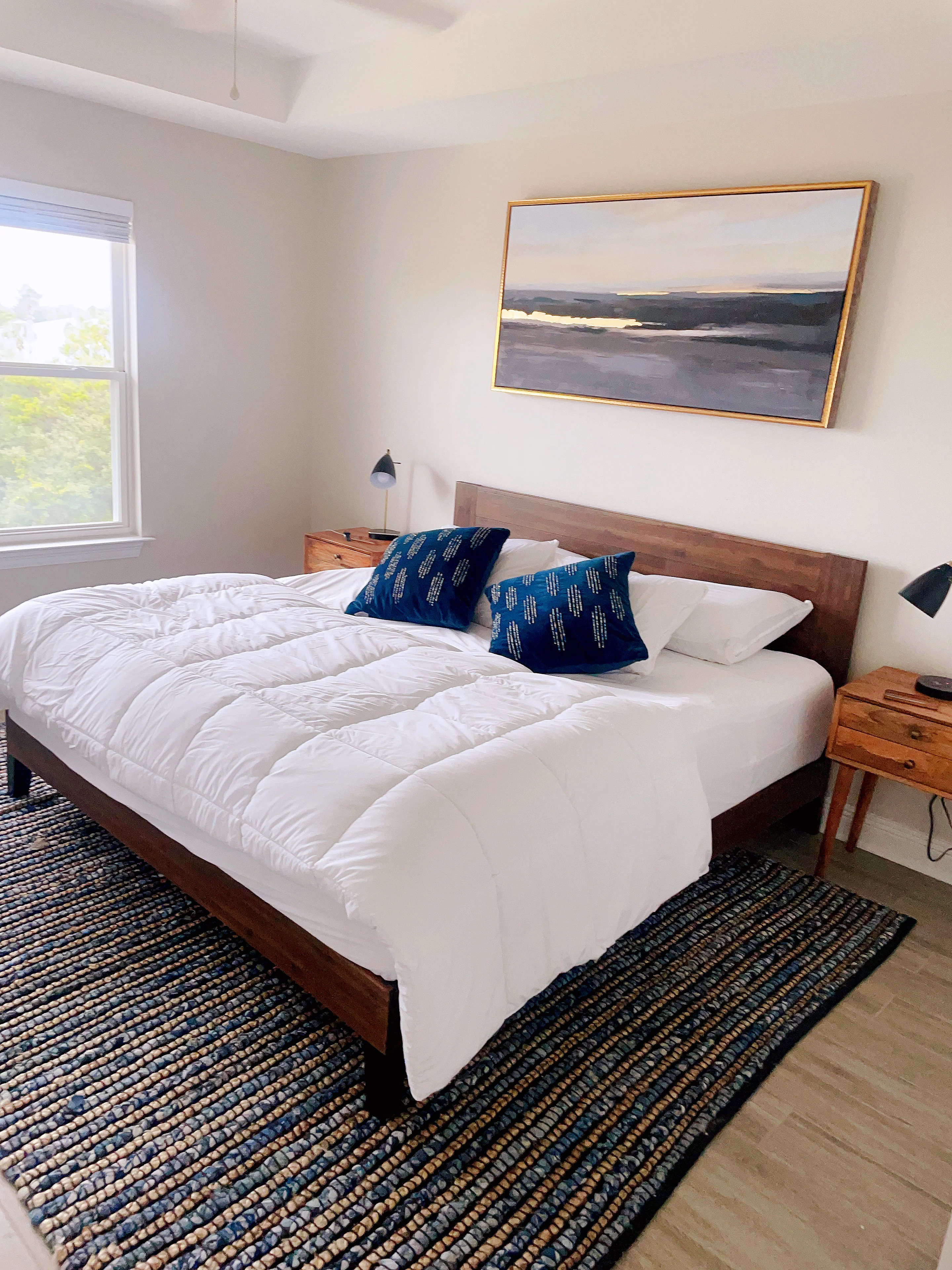 Bright dormitory bedroom with four bunk beds for group accommodation in Panama City Beach vacation rental
