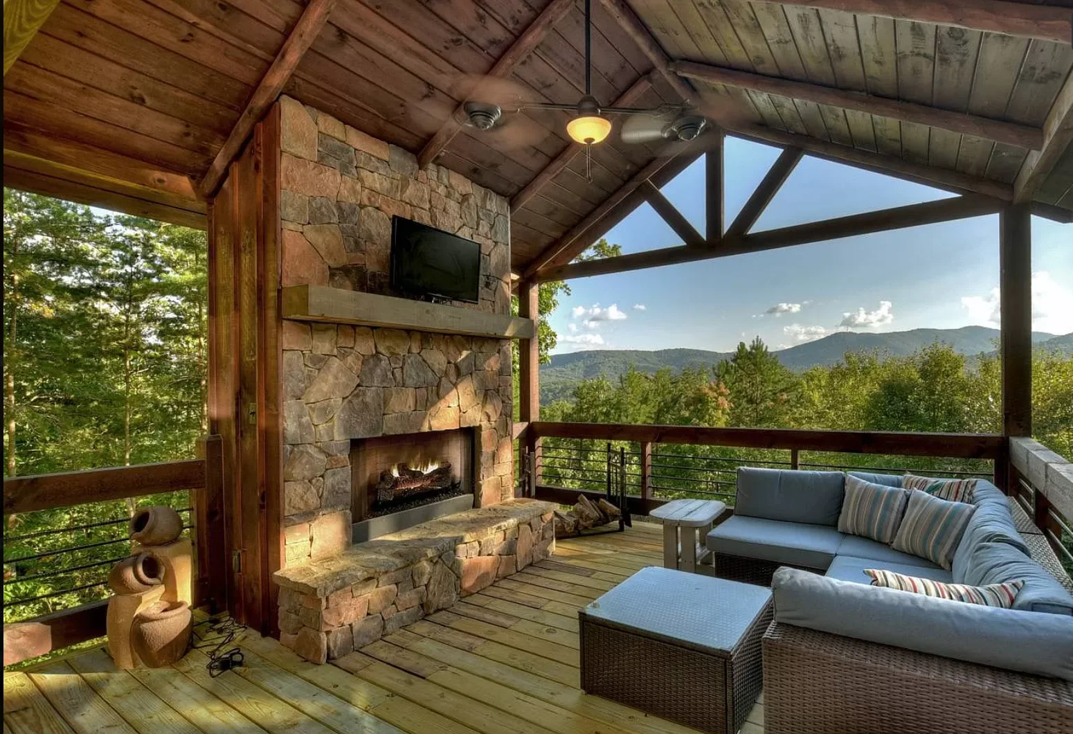Blue Ridge vacation rentals Georgia mountain patio with stone fireplace and ridge views