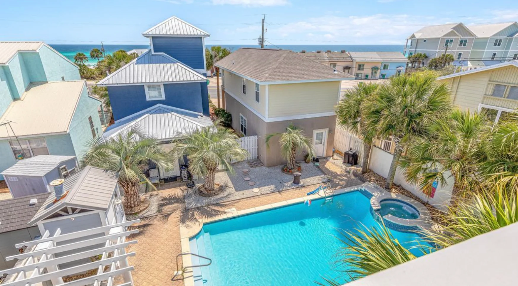 Waterfront villa patio at sunset, an example of the group-friendly space Panama City Beach house rentals should offer