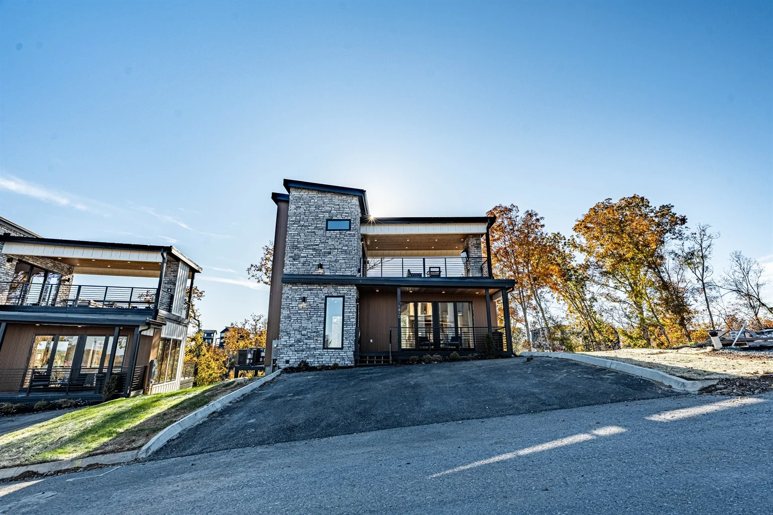 Modern cabin exterior with mountain views perfect for hikers exploring Smoky Mountain trails