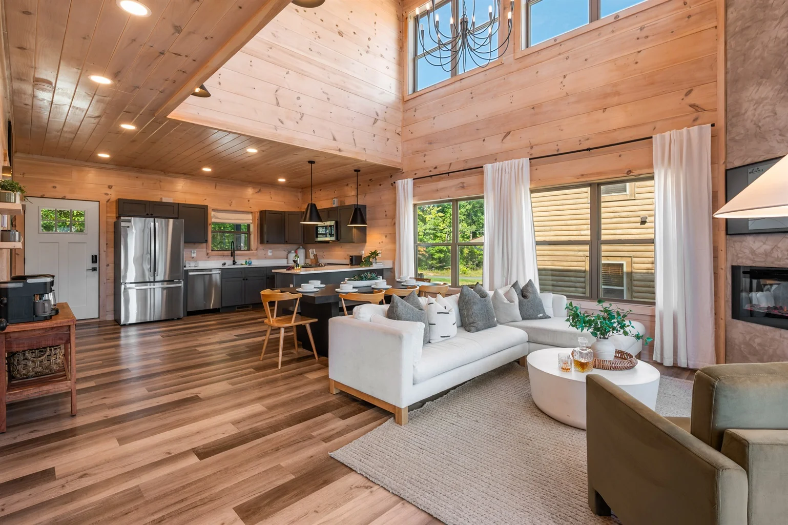 Modern log cabin living room with open concept kitchen for Smoky Mountains weekend itinerary base camp