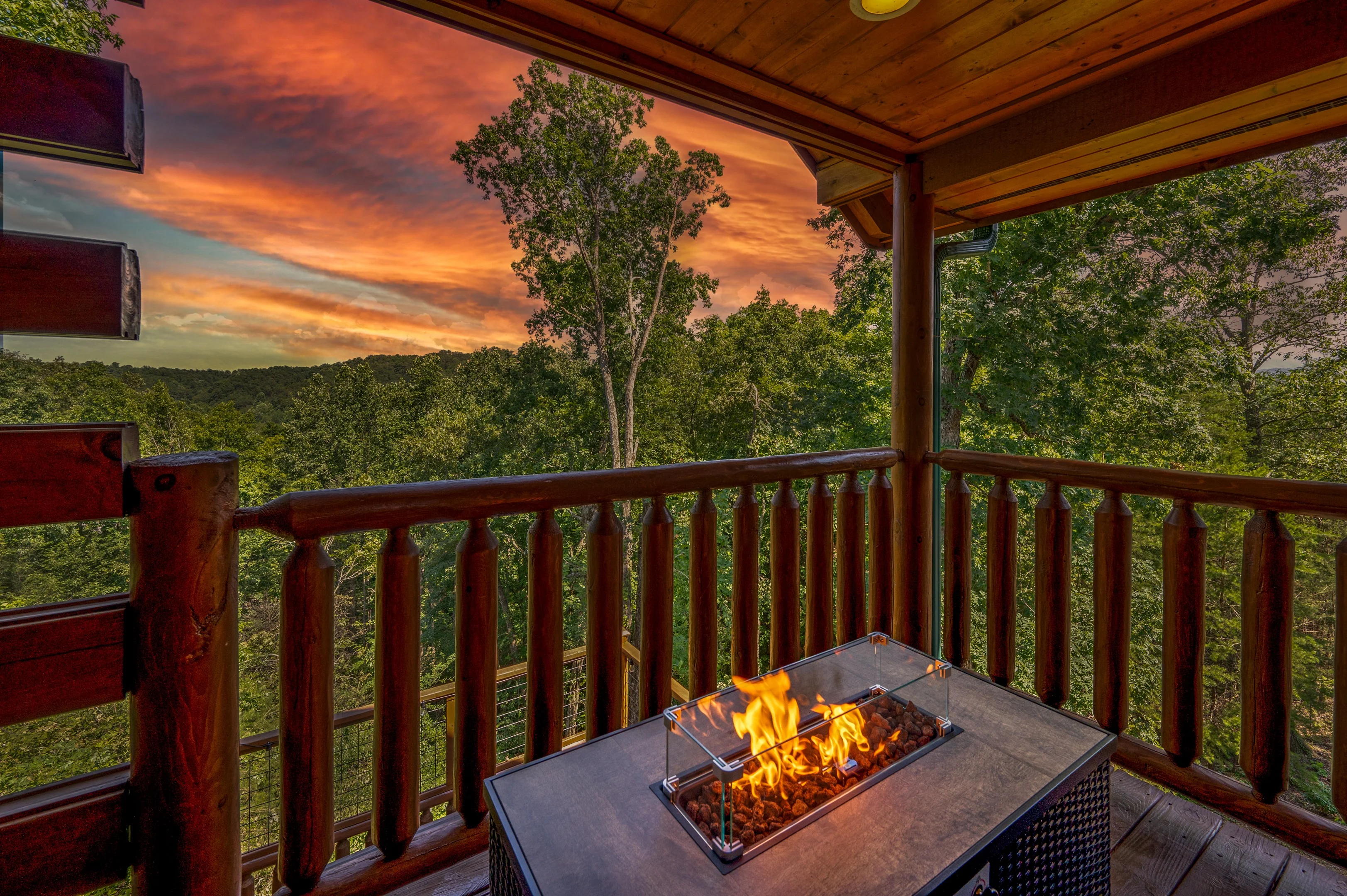 Secluded pet friendly cabin with fire pit overlooking forest sunset in Smoky Mountains