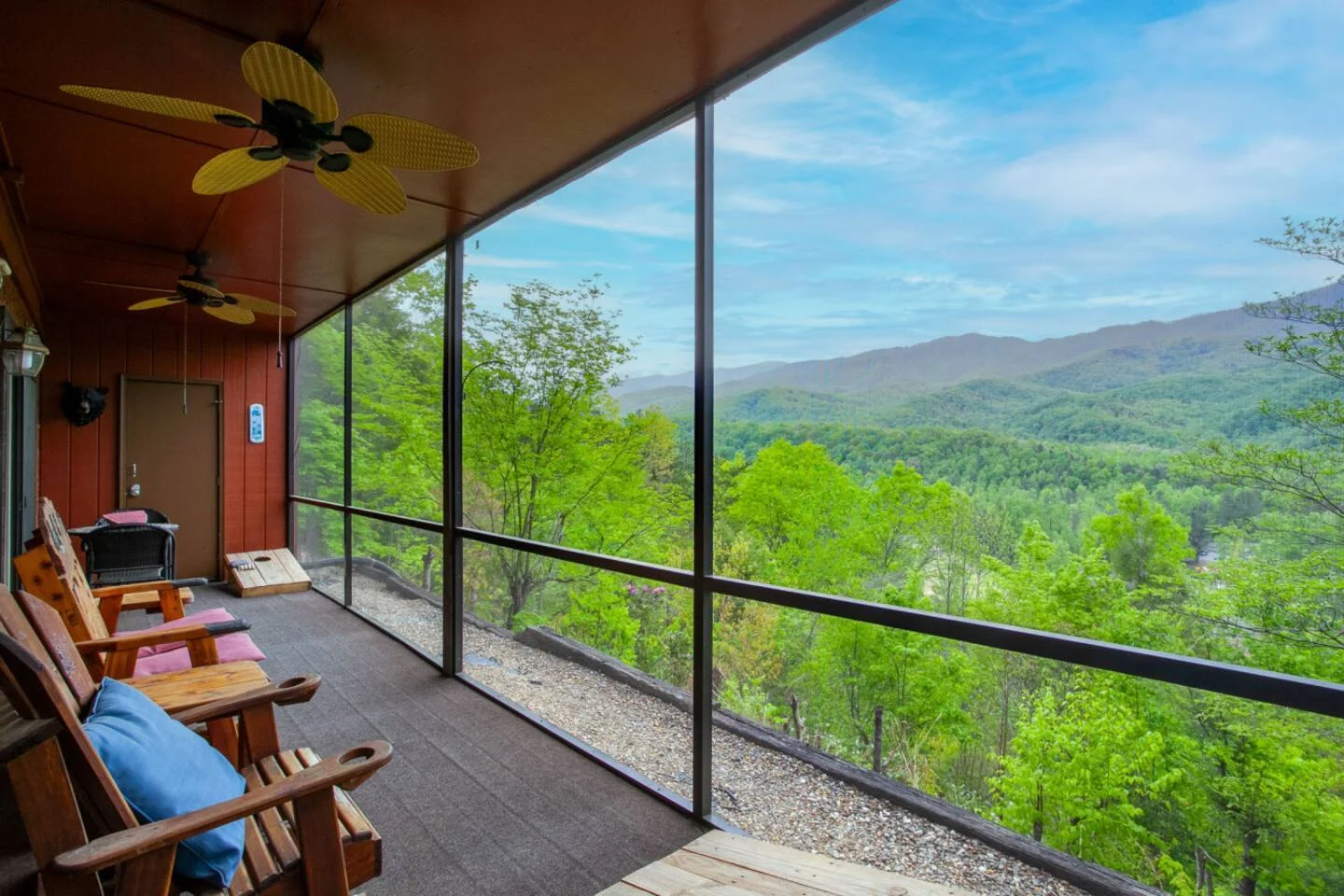 Screened porch with mountain valley views at Serene Escape, one of the best vacation rentals in Gatlinburg Tennessee