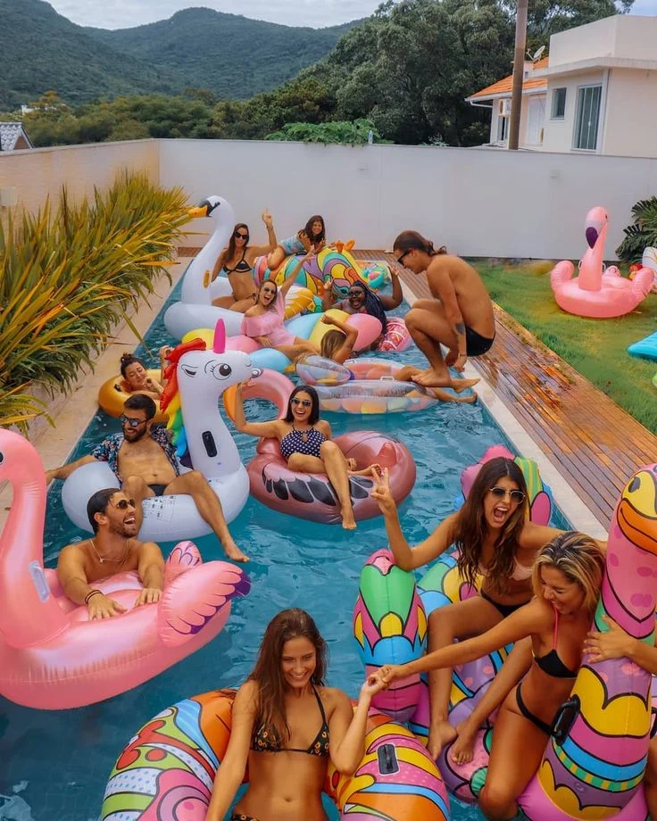 Luxury pool party with concierge-arranged amenities at Palm Springs vacation rental