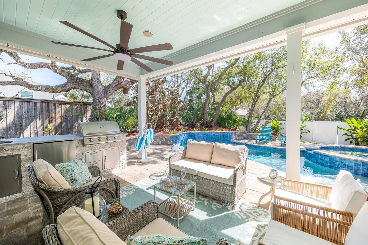 Luxury patio with resort-style pool and outdoor kitchen at St Augustine FL house rental