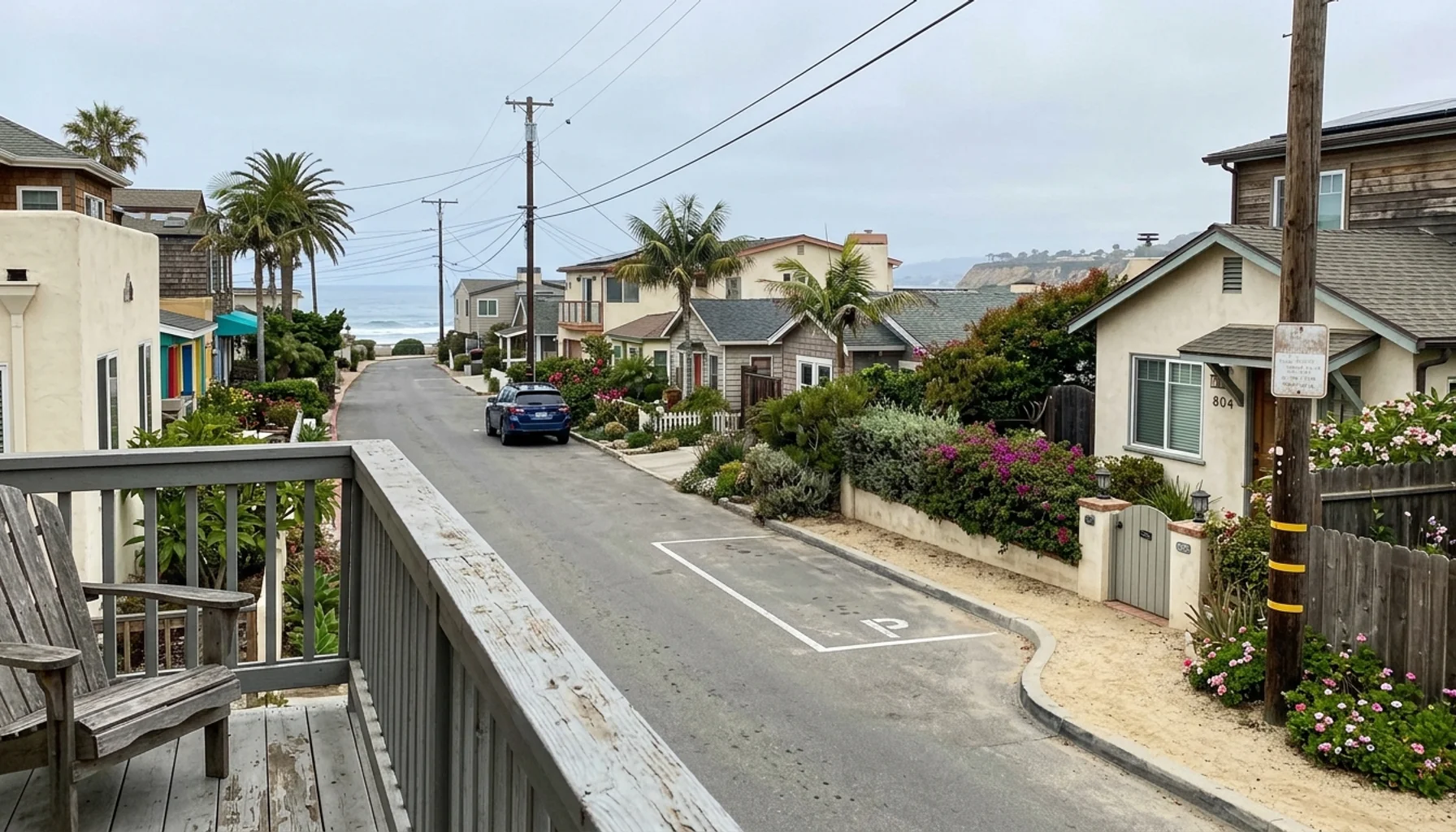 Coastal La Jolla Shores bungalow street with a dedicated parking spot and permit placard for vacation rental owners