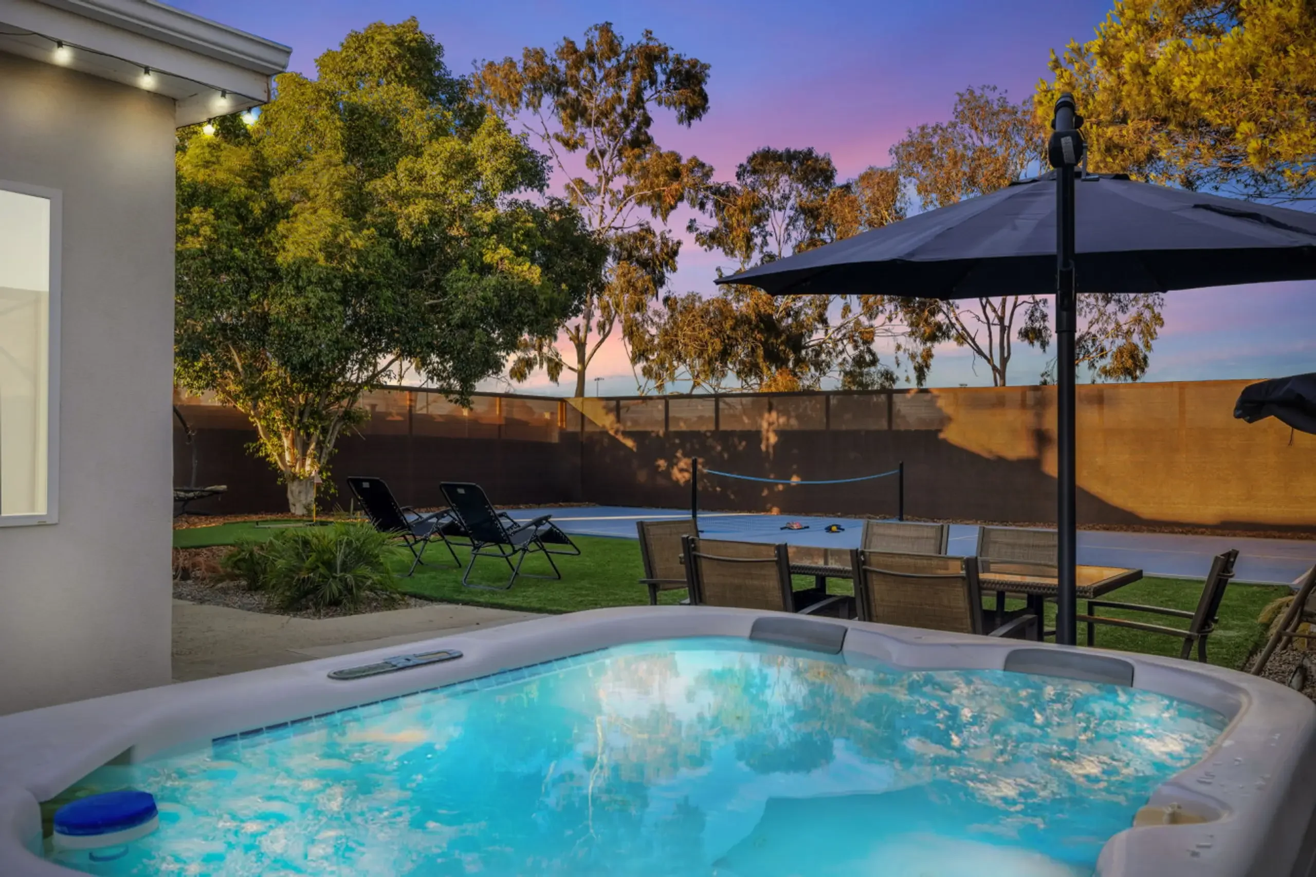 Luxury backyard with spa and pool at a downtown San Diego property managed by best airbnb management companies