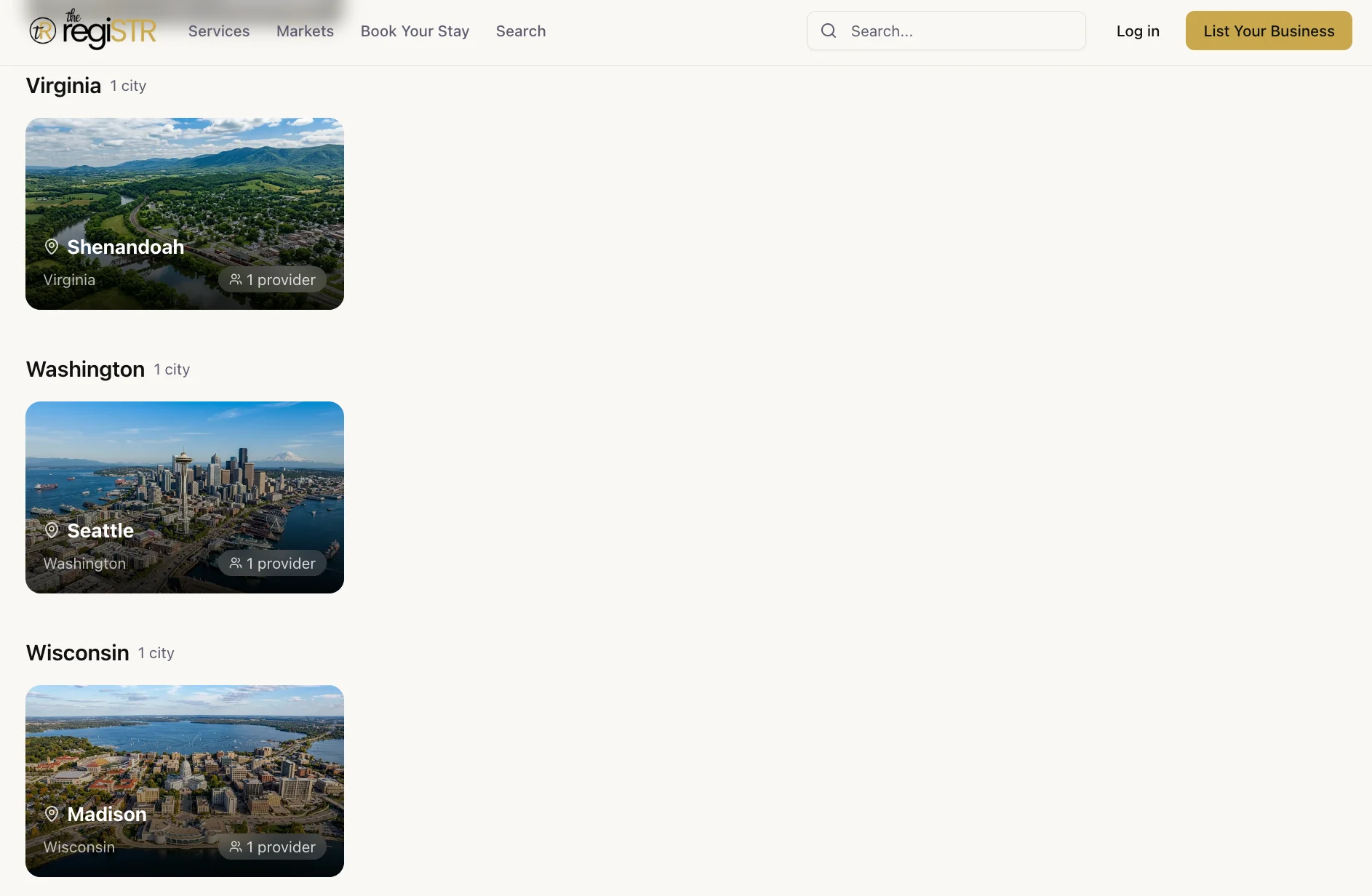 Aerial view of rolling green mountains, valleys and winding river through Shenandoah Valley countryside