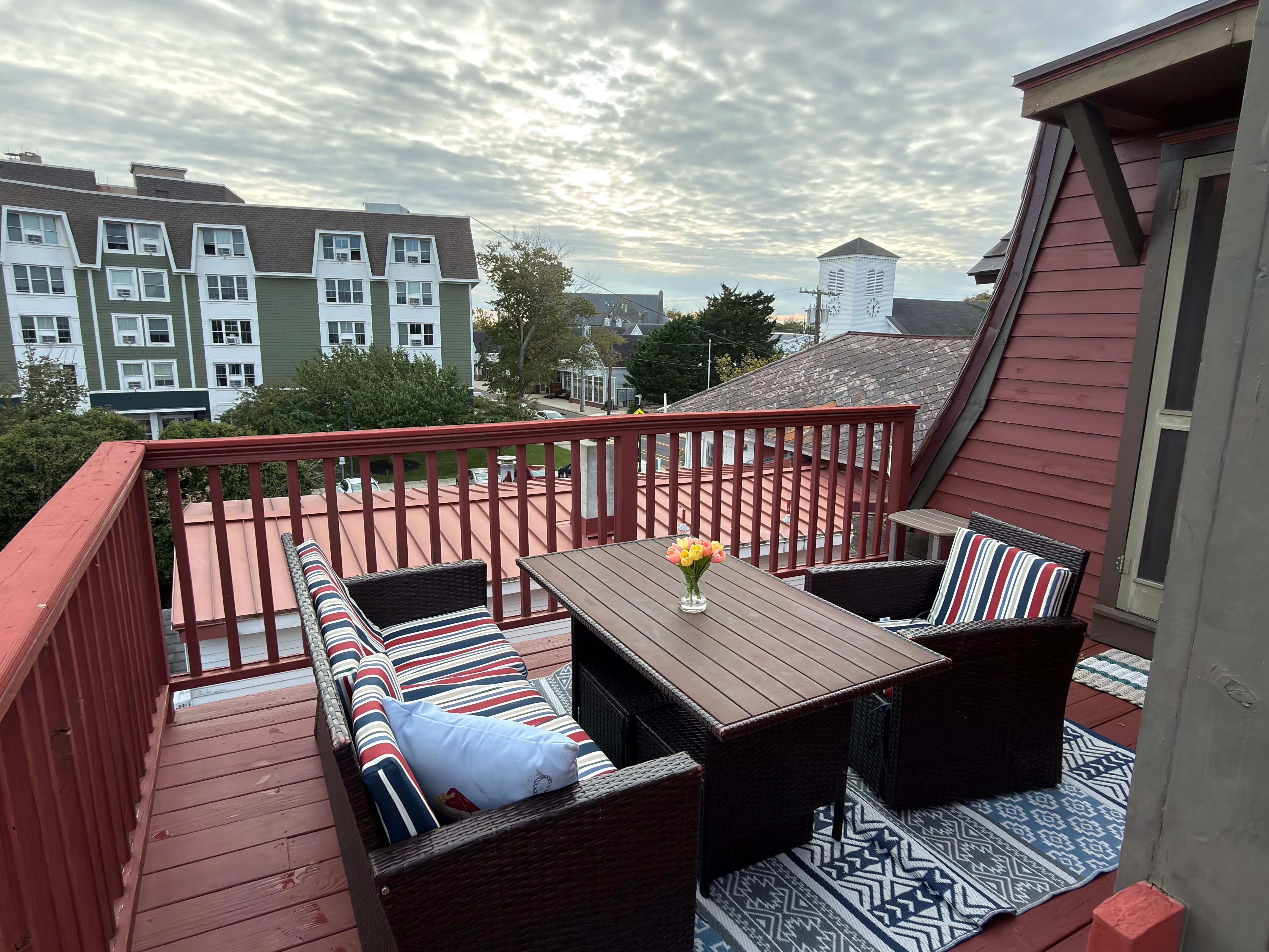 Coastal deck with nautical railings overlooking Cape May Point waterfront village, ideal for hawk watching during fall