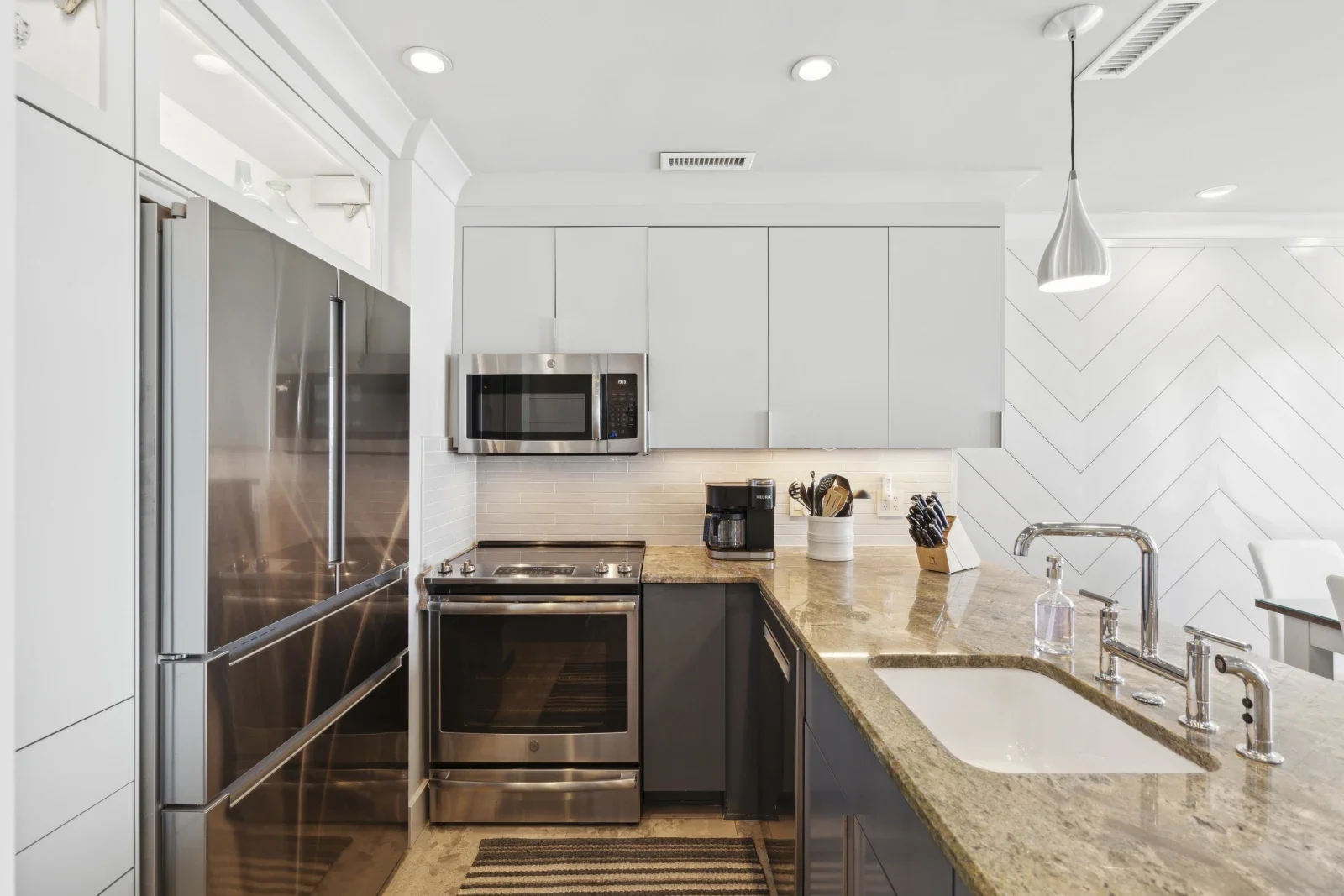 Modern luxury island getaway kitchen with stainless steel appliances and granite countertops at Kiawah Island