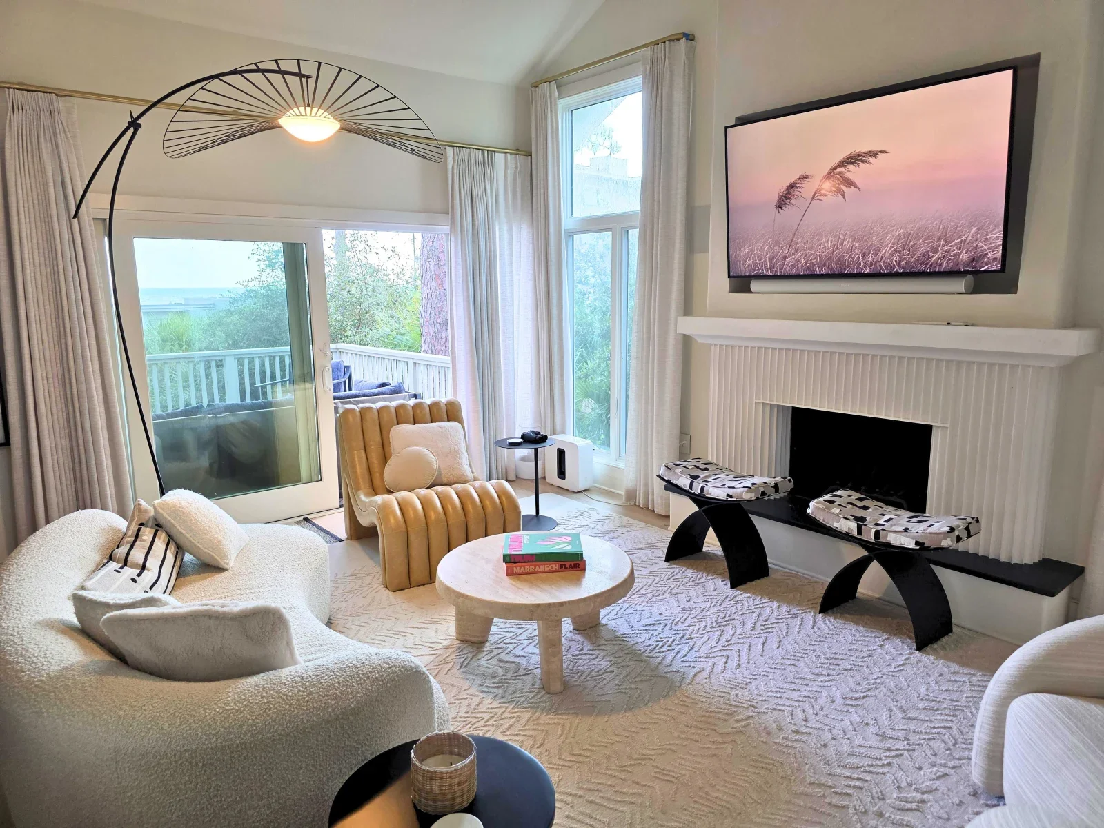 Modern living room with ocean view and floor-to-ceiling windows at a Kiawah Island where to stay property