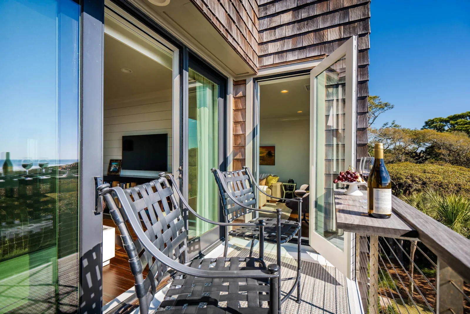 Oceanfront condo balcony with lounge seating and ocean views on Kiawah Island SC