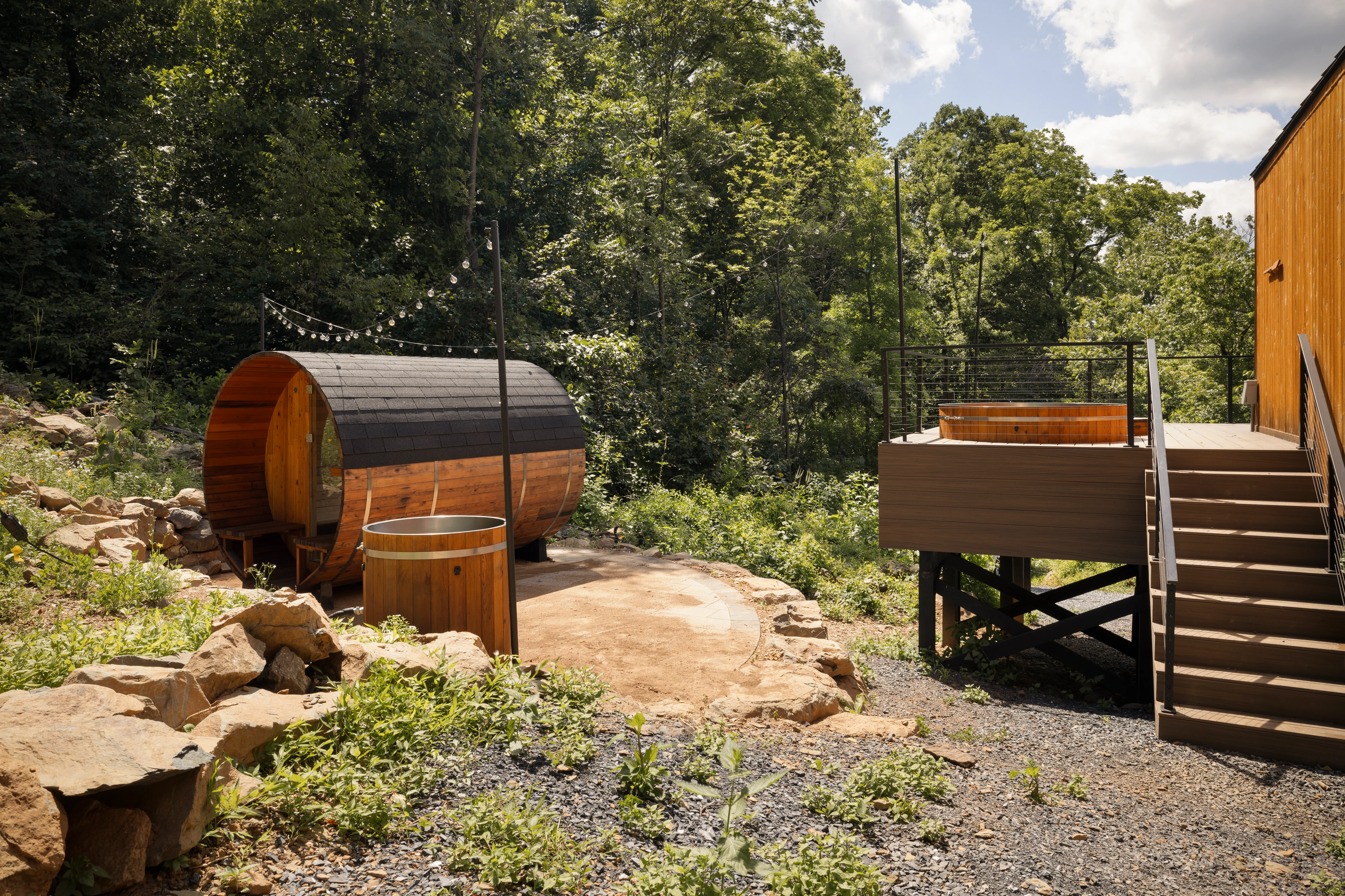 Wooden barrel sauna and hot tub at one of the Shenandoah cabins that allow dogs