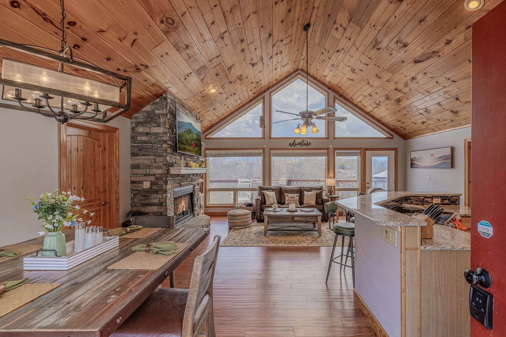 Great room with stone fireplace at a bachelorette getaway Gatlinburg cabin