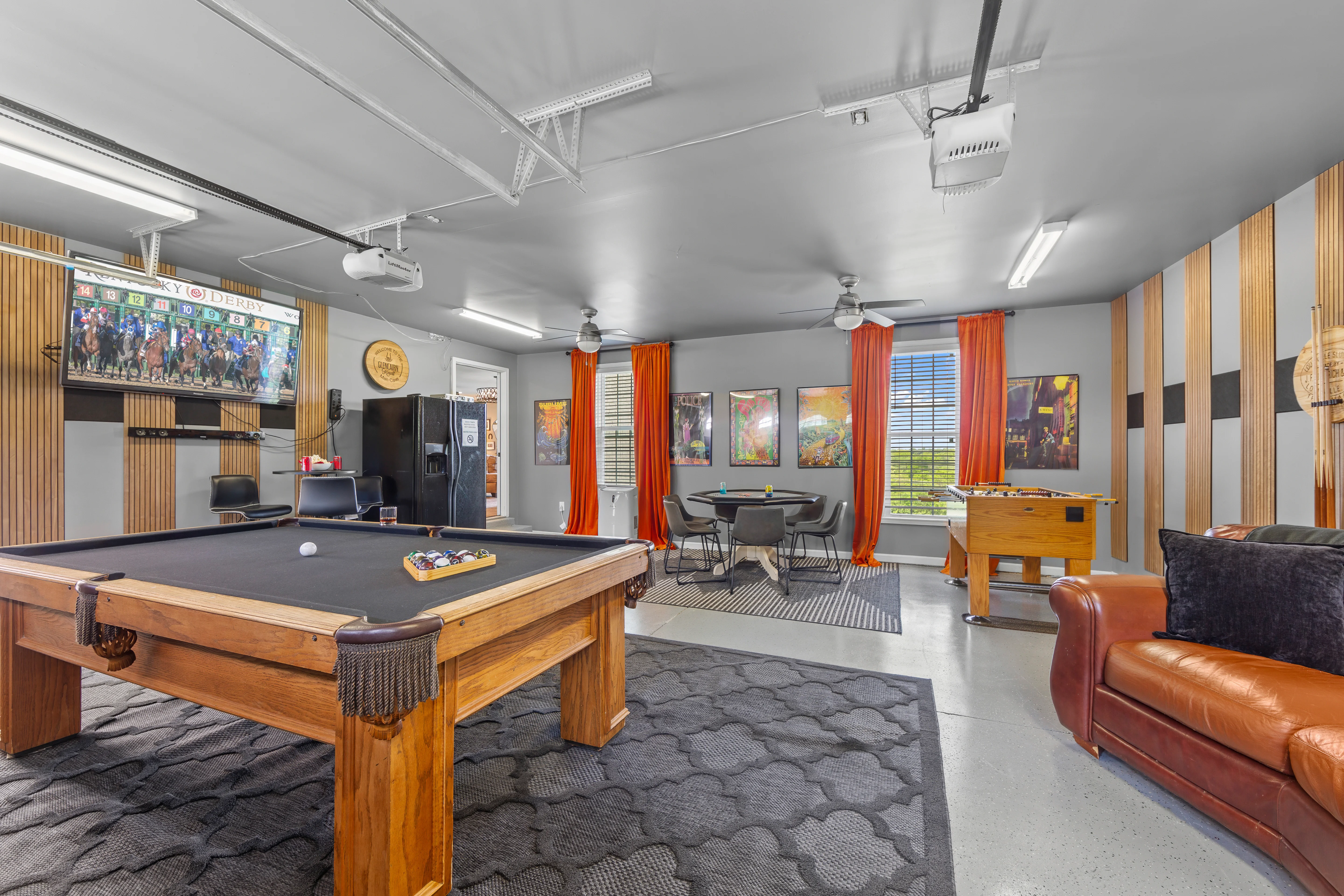 Game room with pool table and foosball for groups deciding what to do in Louisville KY tonight
