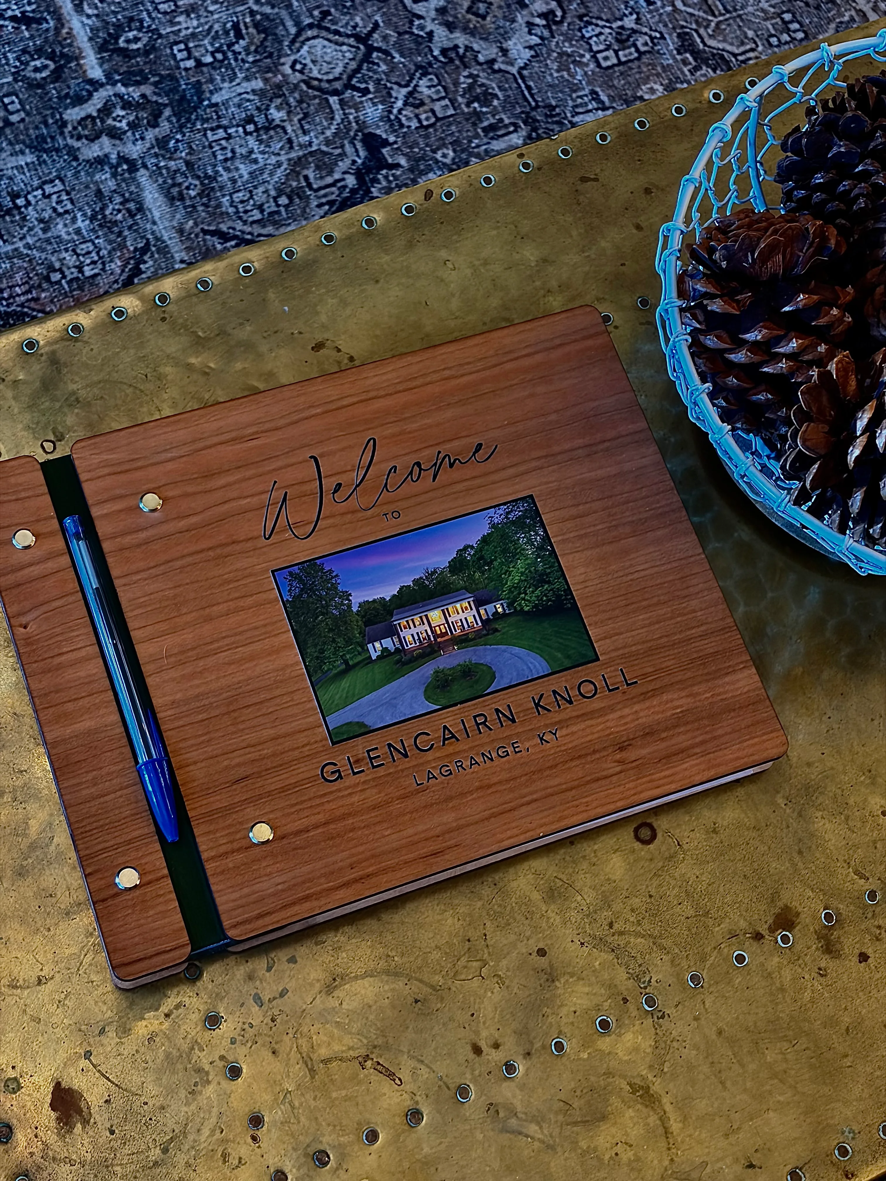 Wooden welcome plaque for top rated Airbnb La Grange with illustrated estate detail