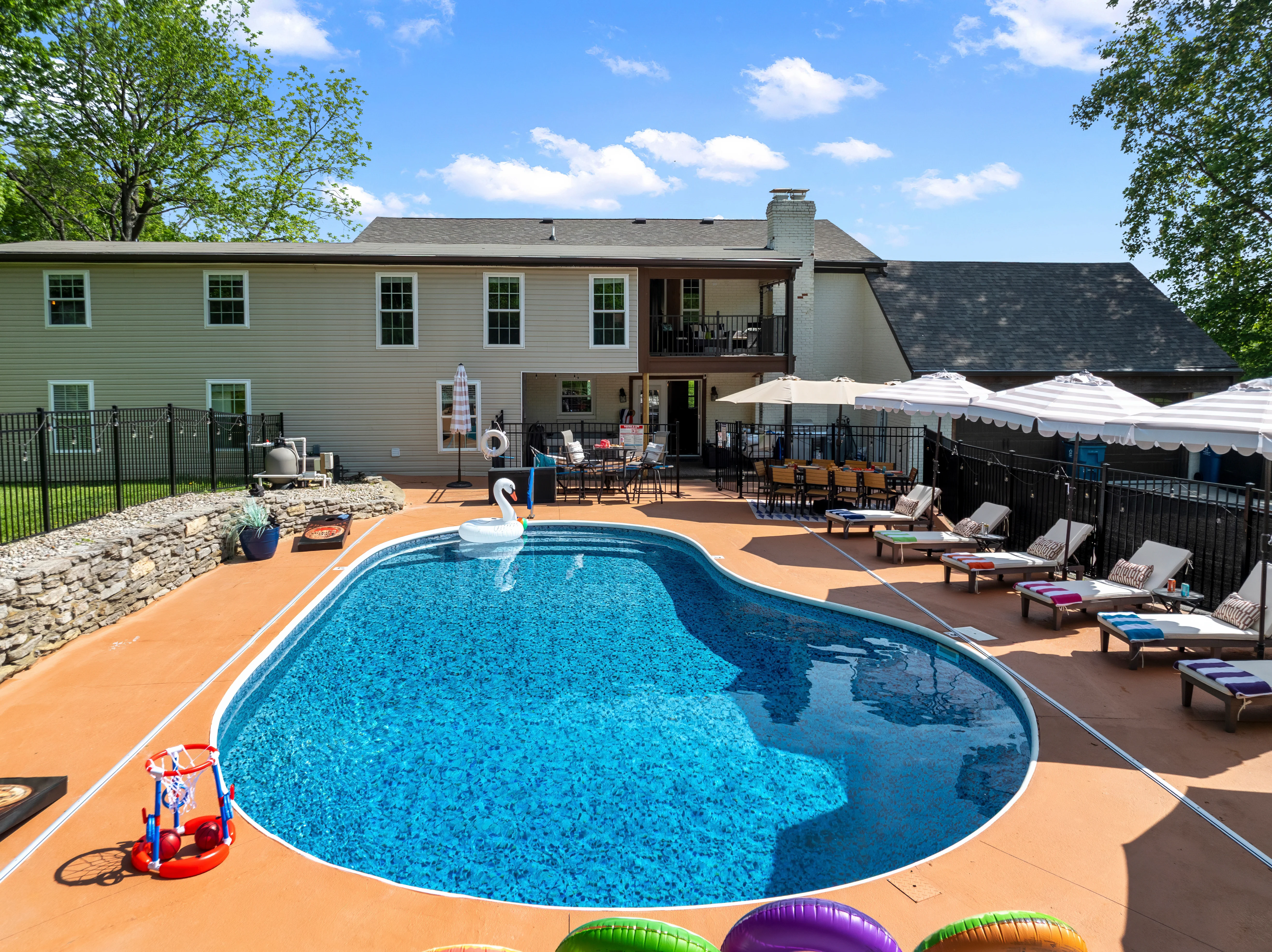 Family reunion house with pool Louisville: heated saltwater pool and patio at Glencairn Knoll